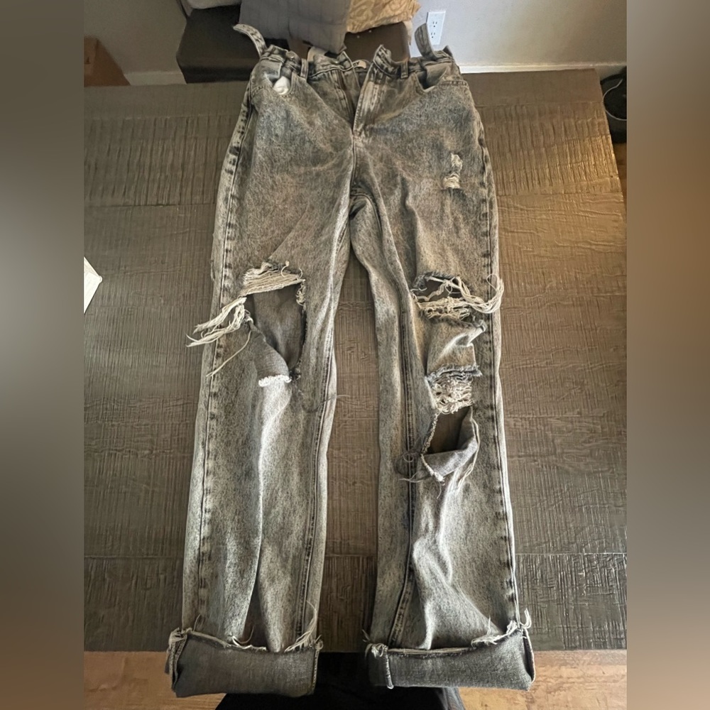 ripped gray wash jeans